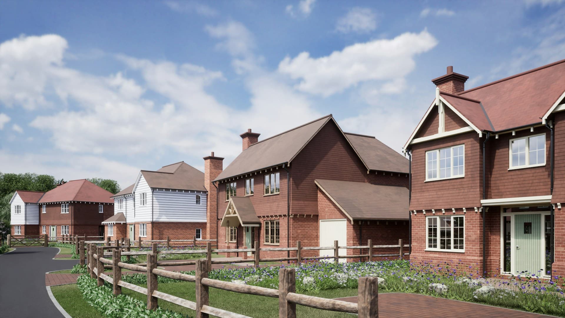 A row of red brick residential houses along a London street